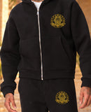 Ensemble sweat zippé et pantalon homme Kemet Noir – détail des logos côté cœur et poche gauche