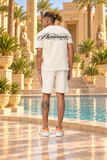 Ensemble New Pharaon beige, vue de dos : logo Pharaonique légèrement remonté, rendu mat suivant le tissu