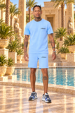Ensemble short tee-shirt Homme New Pharaon bleu, vue de face avec logo Pharaonique noir côté cœur et poche gauche
